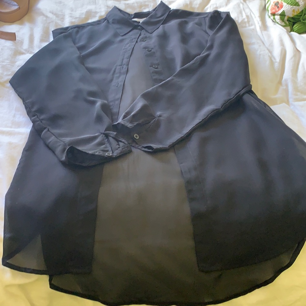 Elan black sheer oversized top. Easily converted to roll up sleeve with button.